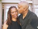 African-american couple embracing.